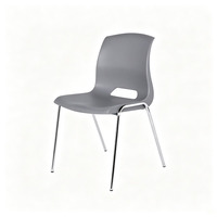 Chaise d'école moderne en plastique orange, écologique, ergonomique et empilable