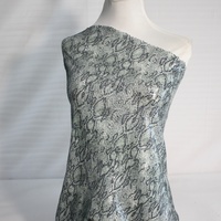 Tissu à paillettes imprimé motif serpent tendance, 100% polyester, tissu en maille scintillante pour vêtements féminins