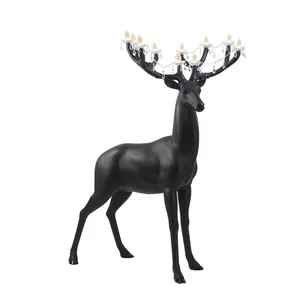 2 meter high magical deer shaped sculpture whose antlers become chandeliers decorated lamp with crystals and pendants.