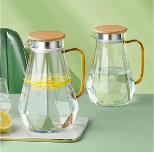 <span class=keywords><strong>Carafe</strong></span> à eau en verre borosilicate de 1,5 L (50 oz) avec couvercle filtrant en acier inoxydable et ensemble de 4 tasses, résistante à la chaleur, pour jus et eau - Product Image 3