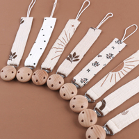 Vente en gros de chaîne de sucette pour bébé multicolore en pur coton avec logo personnalisé de sécurité avec clip en bois