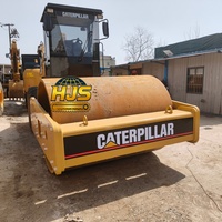 Compacteur vibrant d'occasion Caterpillar CS683E, modèle 2022, 129 kW, à tambour unique, pour la construction routière