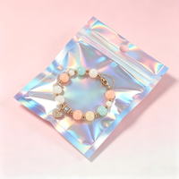 Accessoires pour sacs en plastique laser de qualité supérieure, boucles d'oreilles, sachet holographique à fermeture éclair, pochette plate pour emballages de bijoux