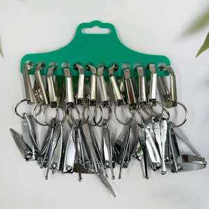 Ensemble de coupe-ongles multifonctionnel portable avec porte-clés, pendentif clé, outils de soin des ongles pour la maison, articles de vendeur ambulant à 2 yuans. - Product Image 2