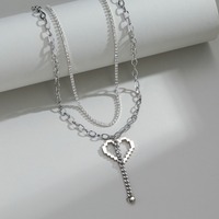 Collier double couche tendance avec pendentifs cœur ajourés uniques, accessoires chics en acier inoxydable, bijoux de mode 2026 TGXL14772