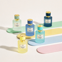Flacon de parfum vide cylindrique artistique et coloré de 50 ml, personnalisé, luxueux, unique, avec couvercle doré, en verre, avec boîte cadeau