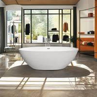 Baignoire autoportante ovale en pierre moderne de 1,5 m avec vidange centrale et robinet pour salle de bain d'hôtel