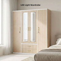 Armoire de luxe en acier imprimé avec miroir tactile et 4 portes métalliques, dotée d'un tiroir, pour chambre à coucher et mobilier de maison