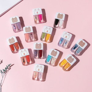 ชุดทำเ<span class=keywords><strong>ล</strong></span>็บ 2 ชิ้น/เซ็ต 2 สี สีสวยสดใสแบบน้ำ สามารถ<span class=keywords><strong>ล</strong></span>อกออกได้ ชุดยาทาเ<span class=keywords><strong>ล</strong></span>็บ Gemini ชุดยาทาเ<span class=keywords><strong>ล</strong></span>็บคู่ น่ารัก - Product Image 1