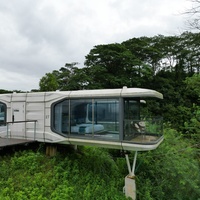 Casas prefabricadas futuristas Pod Hotel Dormitorio Cápsula prefabricada con balcón Casa de cápsula espacial con Sistema Inteligente