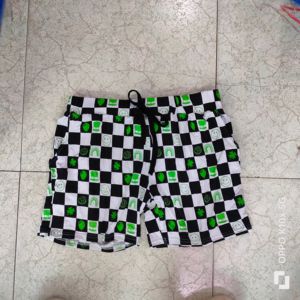 Korte kinderbroekjes van bamboe, casual model, met aantrekkoord, op maat gemaakte blokprint. - Product Image 5