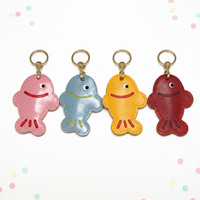 Porte-clés en cuir véritable fait main de haute qualité, écologique, tanné végétal, sculpté en forme de poisson de dessin animé, breloque de sac mignonne en forme d'animal