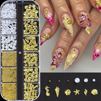 Vente en gros de rivets en métal 3D en forme de coquillage, fleurs décoratives multi-formes pour ongles, accessoires de strass pour la décoration des ongles en salon de manucure