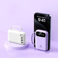 Batterie externe portable 10000 mAh avec câble intégré 4-en-1, puissance de sortie 10W, double éclairage LED et ports USB pour tous les téléphones