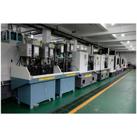 Système de perçage polyvalent : Machine CNC multi-broches à 2 stations pour les opérations de perçage, de taraudage et de perçage multi-axes