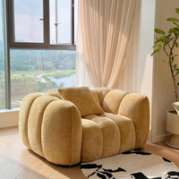 Fauteuil moderne capitonné en mousse compressée avec emballage sous vide pour appartement et villa