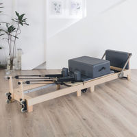Suministro al por mayor de reformadores de Pilates de roble plegables, equipos de fitness para gimnasio, fábrica OEM personalizada
