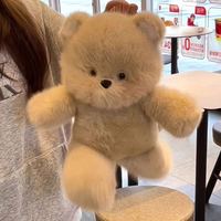 Un populaire ours en peluche de la série Animal. Il s'agit d'un jouet en peluche, d'un oreiller tendance et d'une figurine décorative.