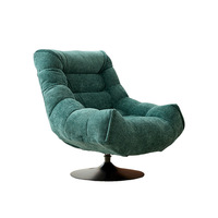 Fauteuil de salon pivotant de style italien, design nordique minimaliste et luxueux, pour la maison, le salon ou le balcon, avec pouf intégré.