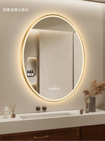 Miroir de salle de bain intelligent ovale encadré mural en verre avec éclairage LED, de luxe, pour salle de bain et coiffeuse