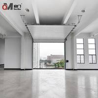 QIMEN, fabricant depuis plus de 20 ans, porte sectionnelle industrielle électrique pour entrepôt, certifiée CE, sans CFC, résistante au vent