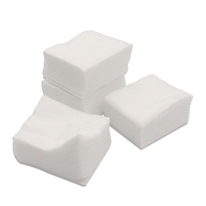 Tampons jetables en tissu non tissé spunlace pour salons de beauté, hôpitaux dentaires et cliniques ; tampons compressés humides ; double usage (sec et humide) - Product Image 1