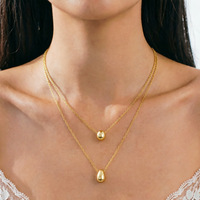 Collier pour femme en acier inoxydable double couche anti-ternissement plaqué or 18 carats avec chaîne à maillons et pendentif goutte d'eau, tendance et minimaliste