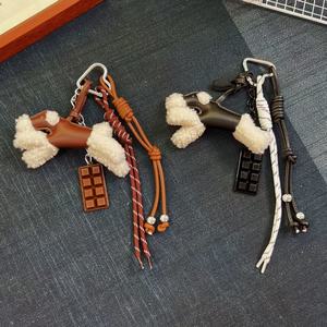 Llaveros de moda ligeros de felpa 3D, colgante portátil de perro de dibujos animados, dije de chocolate, llavero de poodle de PU para bolso de mujer - Product Image 1