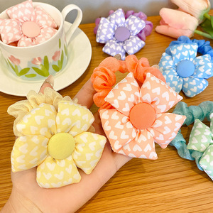 Élastiques à cheveux en forme de fleur pour filles et petites filles. Ces élastiques pour cheveux n'endommageront pas les cheveux et ont une bonne élasticité. - Product Image 1