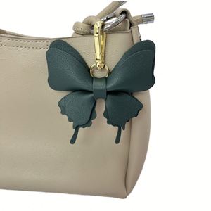 Porte-clés papillon mignon en cuir PU, 6 couleurs, pendentif pour sac à main pour femme, accessoire de mode de haute qualité et durable - Product Image 4