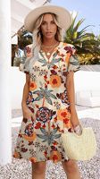 Gaun T-shirt longgar musim panas wanita gaun Boho kasual saku bermotif gaun Midi pantai liburan harian wanita
