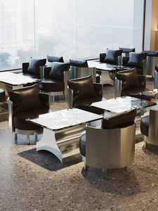 Bar-café de style industriel avec comptoir en granit et ensembles de chaises pour réunions d'affaires et canapés de détente - Product Image 4