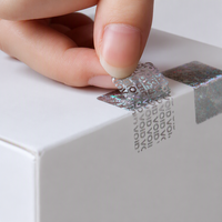 Autocollants de sécurité holographiques personnalisés, étiquettes inviolables, sceaux de garantie transparents argentés pour l'emballage