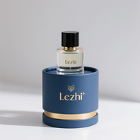 Boîte rigide de luxe personnalisée pour parfum avec logo estampé or, emballage de parfum indépendant en forme de baril rond mat avec EVA