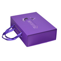 Luxuriöse, faltbare Papierbox mit Magnetverschluss und Griffen in Lila mit individuellem Logo für Haarverlängerungen und Perücken