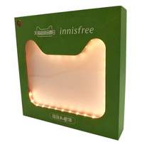 Boîte d'emballage rigide avec logo personnalisé de luxe, éclairée par LED, avec fenêtre transparente en forme pour la présentation de produits cosmétiques