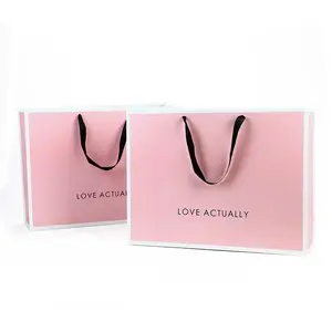 Wholesale Luxury Reusable Handmade DIY Merchandise Wedding Gift Bag Kraft Paper Black Clothing Shopping Bags With Handles