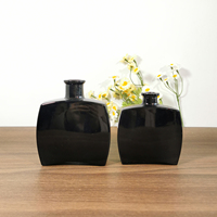 Bouteilles diffuseuses décoratives en verre noir de 120 ml et 200 ml, personnalisables avec logo par estampage à chaud, pour l'emballage d'huiles essentielles aromatiques