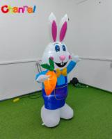 Décor gonflable de lapin de Pâques avec des carottes pour le printemps, la pelouse extérieure et le jardin