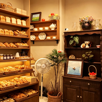 Vitrine de présentation de pâtisseries sur mesure avec éclairage LED/design intérieur de boulangerie