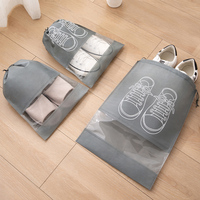 Sac de rangement de chaussures de voyage non tissé simple et portable anti-poussière Portable faisceau bouche dessiner chaîne sac de rangement de chaussures