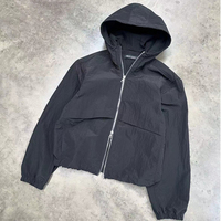 Veste coupe-vent en nylon ripstop à carreaux avec capuche à revers élastique personnalisée par le fabricant pour hommes