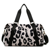 Sac de voyage fourre-tout en toile pour femme, motif léopard, imperméable et grande capacité, idéal pour la gym et les voyages – Meilleure vente