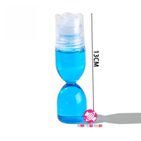 Nouveau produit léchage liquide bonbons coloré sablier forme fruit saveur boule roulante doux liquide bonbons
