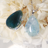 Colliers de pierre lumineuse étoile de mer véritable brillant Bijoux de mode Collier de pendentifs goutte d'eau en résine époxy avec chaîne en acier inoxydable