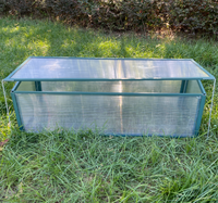 Petite serre de jardin moderne en aluminium écologique résistante aux intempéries pour la culture de semis dans la cour