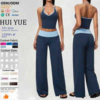Ensemble de yoga sexy européen-américain nouveau style, dos évidé, couleur unie, taille haute, effet push-up, avec débardeur réversible pour le fitness