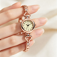 Montre étanche de luxe légère en forme de cœur, sertie de diamants, avec un bracelet fin en acier, montre à quartz pour femme