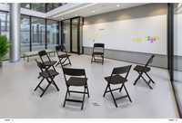 Chaises pliantes d'extérieur en plastique à prix abordable, mobilier de jardin empilable en plastique PP imitation rotin