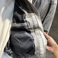 Veste de travail délavée à col montant, multi-poches, effet vieilli, manches oversize, style utilitaire pour la mode urbaine